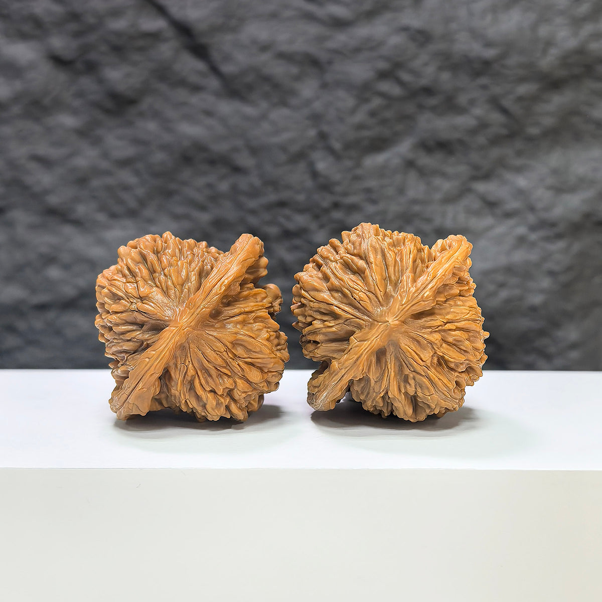 Pair of Sizuolou Wenwan walnuts by Wenwan Art, 42mm x 38mm, featuring natural wood grain and smooth polished surface.
