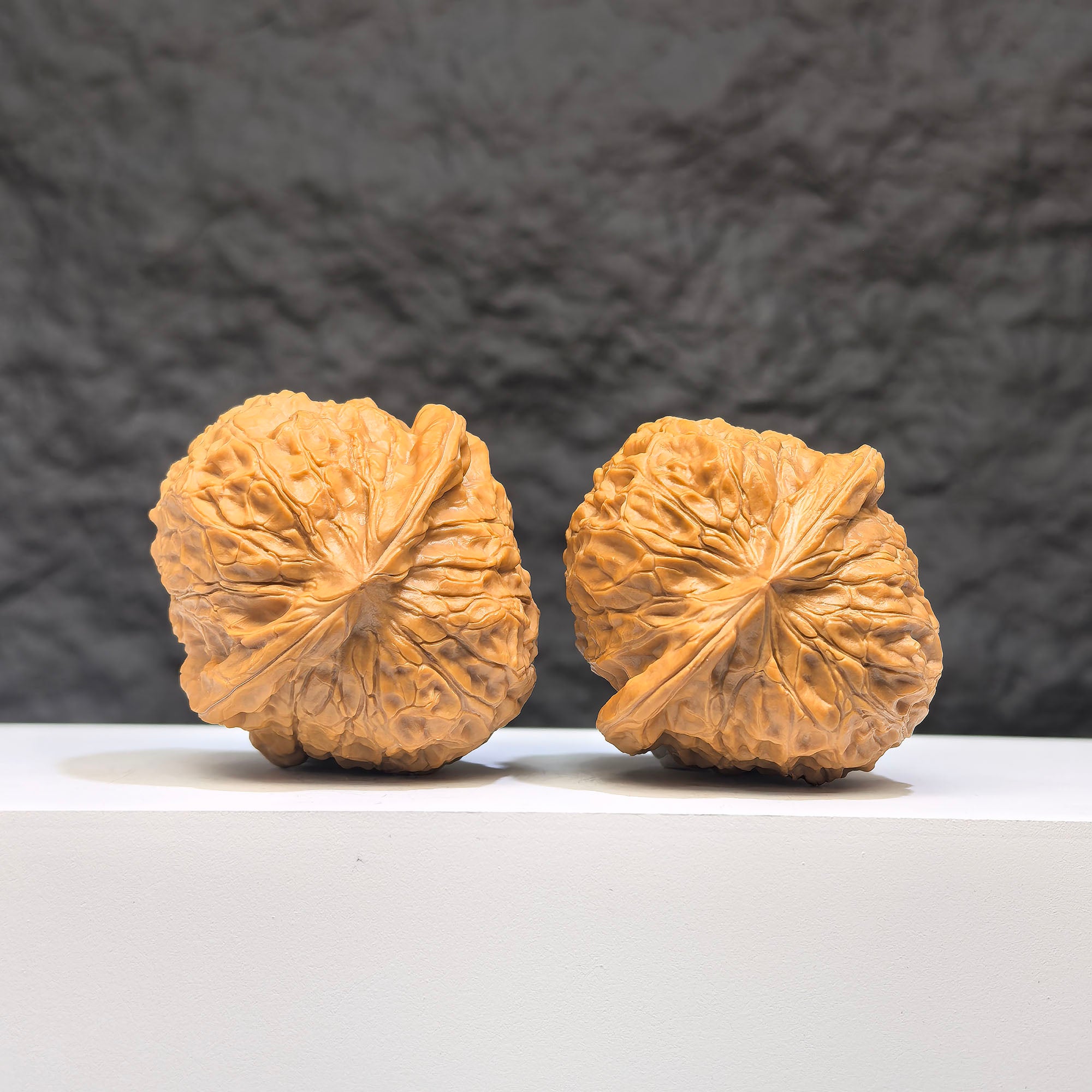 Pair of Pumpkin Pier Wenwan Walnuts by Wenwan Art, 41mm x 44mm, showcasing detailed carved pumpkin design.