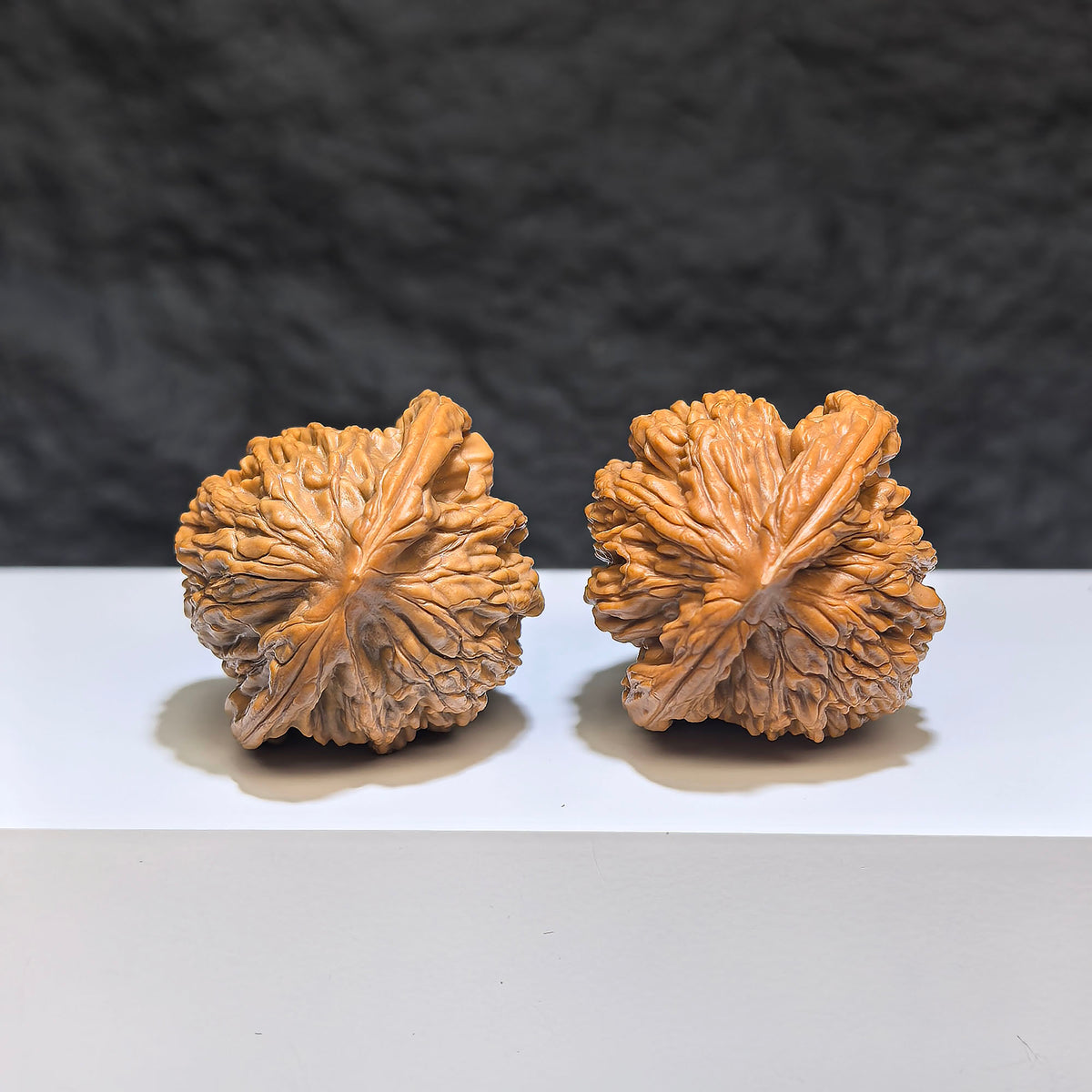Wenwan Art Wheat Ear Tiger Head Wenwan Walnut pair, 38mm x 36mm, featuring detailed tiger head and wheat ear carvings.