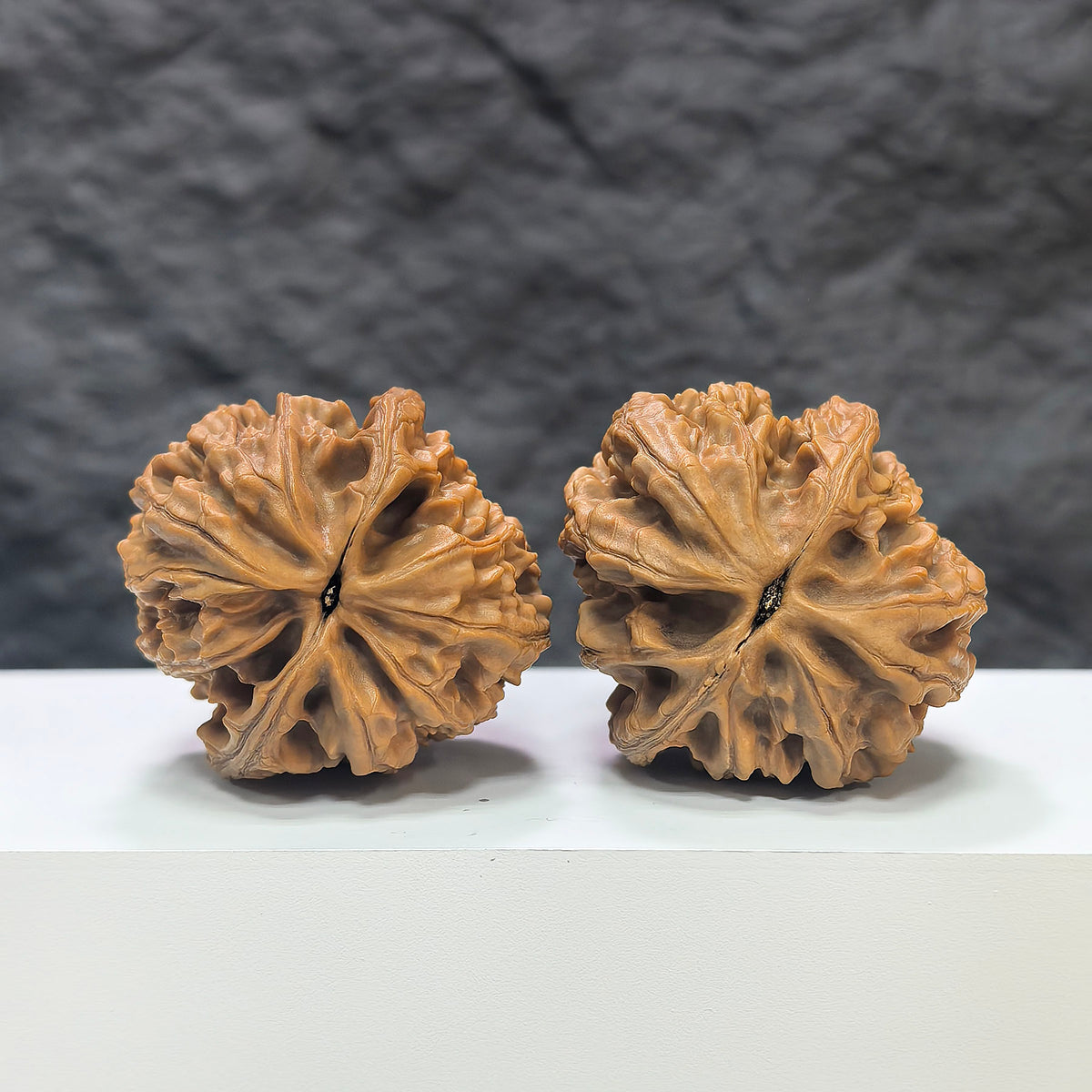 Pair of Classic Scholar Wenwan Walnuts by Wenwan Art, hand-matched Wenwan walnuts, 42mm x 43mm, featuring 大沽石 stone.