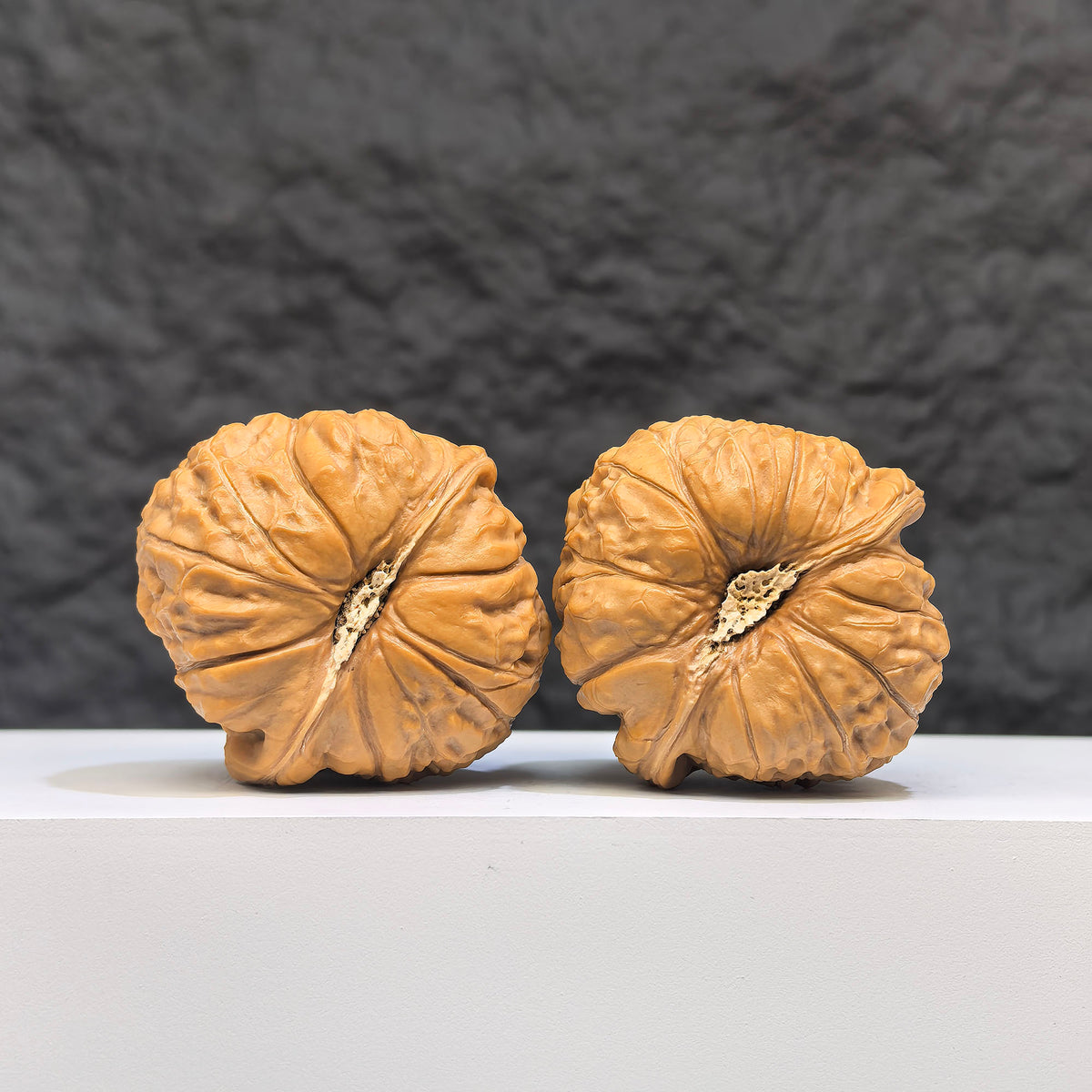 Pair of Wenwan Art Concave Base Pumpkin Pier Wenwan walnuts, deep-base, 40mm x 42mm, showcasing detailed natural wood grain.