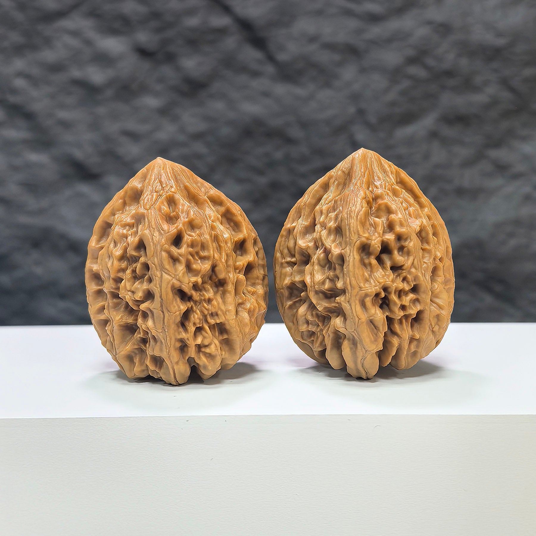 Pair of Beijing Chicken Heart Wenwan walnuts by Wenwan Art, featuring 37mm x 38mm classic walnuts with intricate natural patterns.