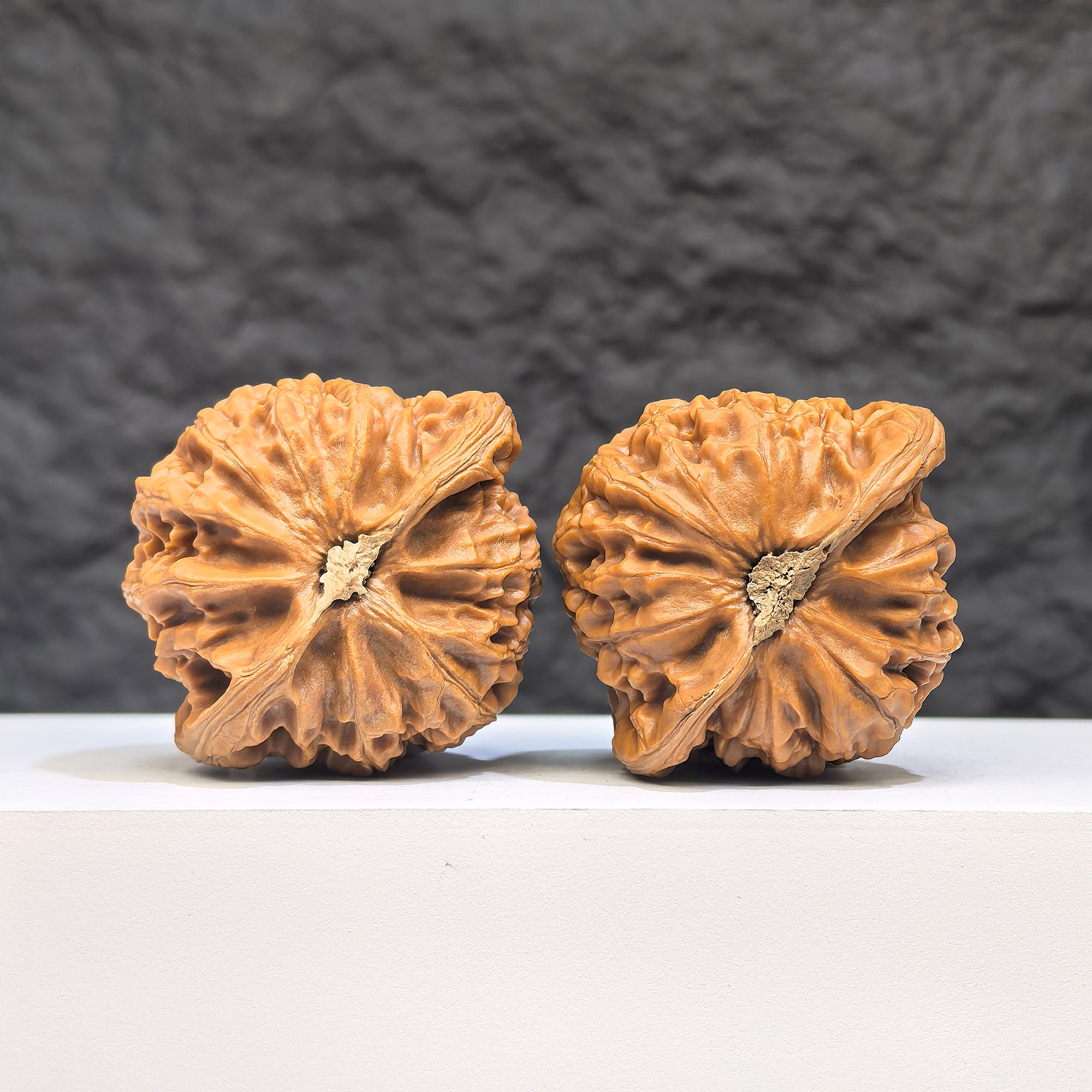 Pair of Palace Lantern Wenwan walnuts by Wenwan Art, 41mm x 37mm, featuring intricate carved designs and traditional craftsmanship.
