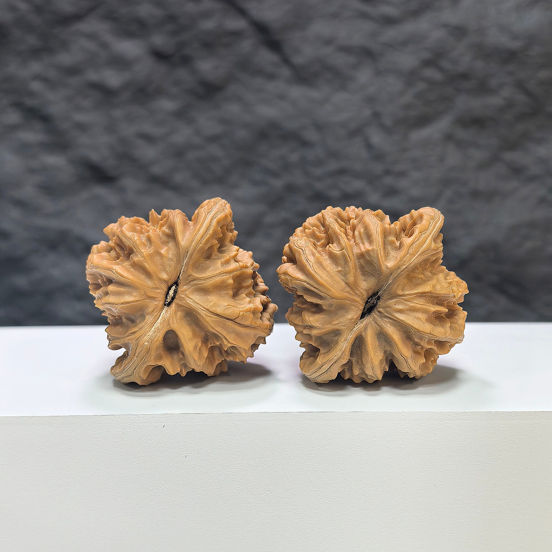 Pair of Xiayunling Peach Heart Concave Base Wenwan walnuts from Wenwan Art, 41mm size, with deep, smooth, heart-shaped bases.
