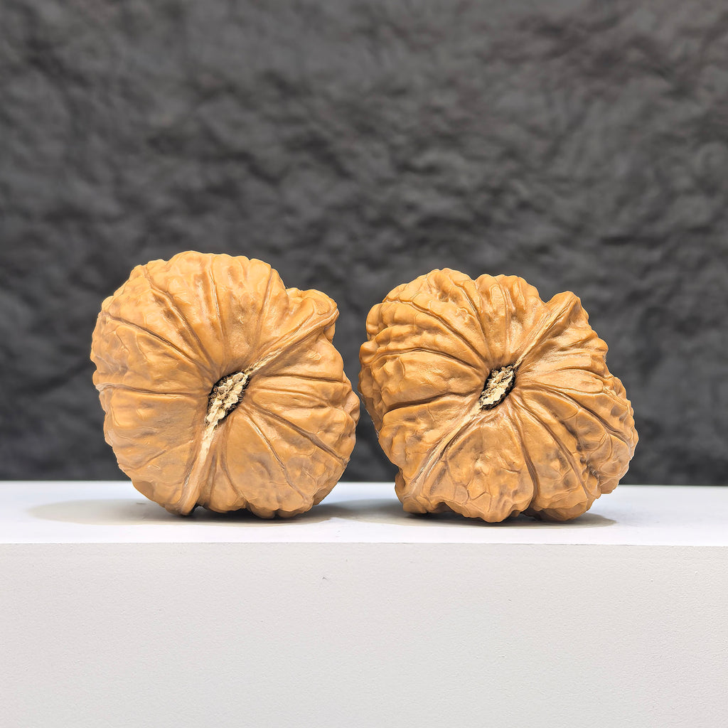 Small Pumpkin Pier Wenwan Walnut pair by Wenwan Art, miniature walnut carvings measuring 39mm x 42mm, detailed natural finish.
