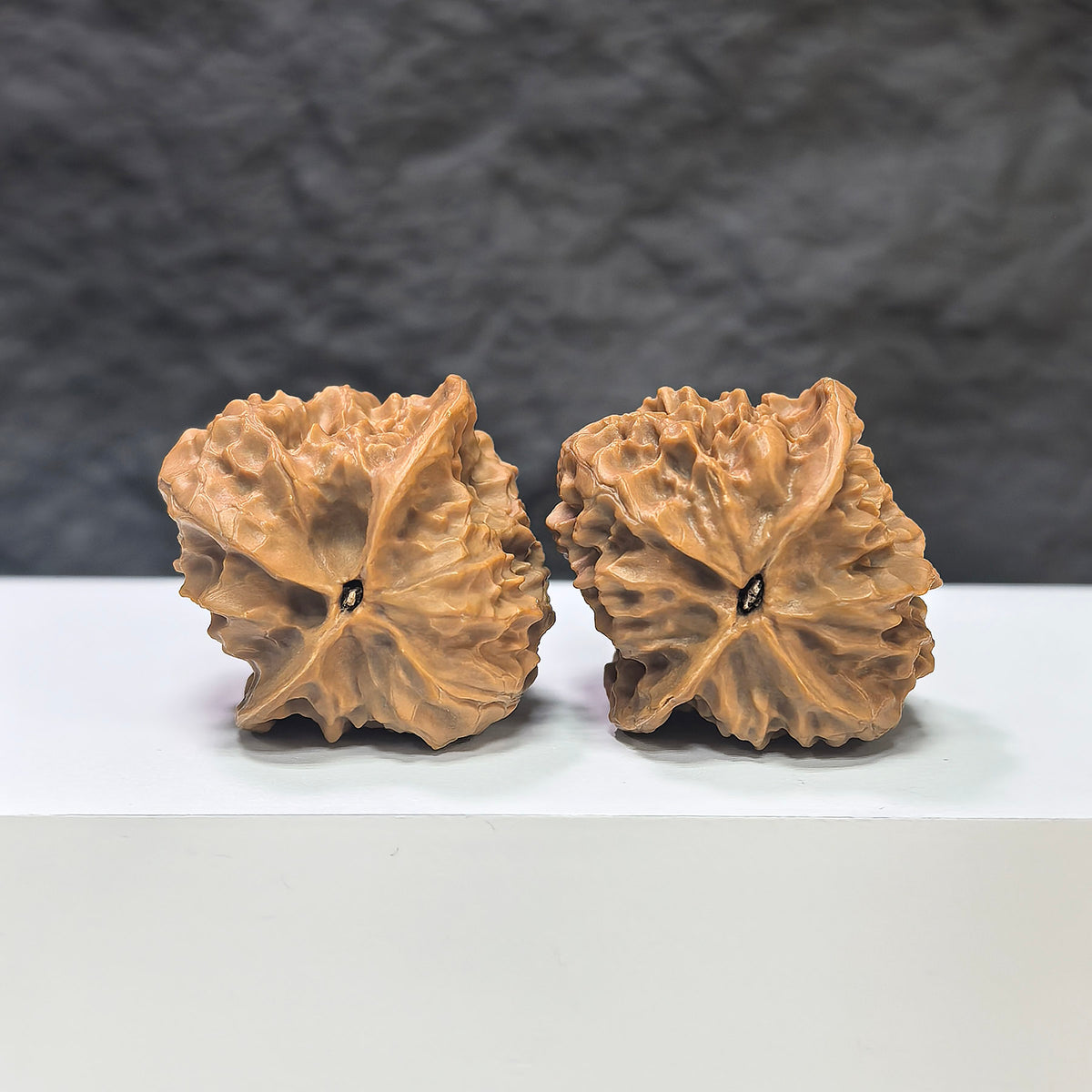 Wenwan Art Linglong x White Snake Valley Classic Wenwan Walnut pair, 33mm x 35mm, showcasing detailed carved walnut sculptures.