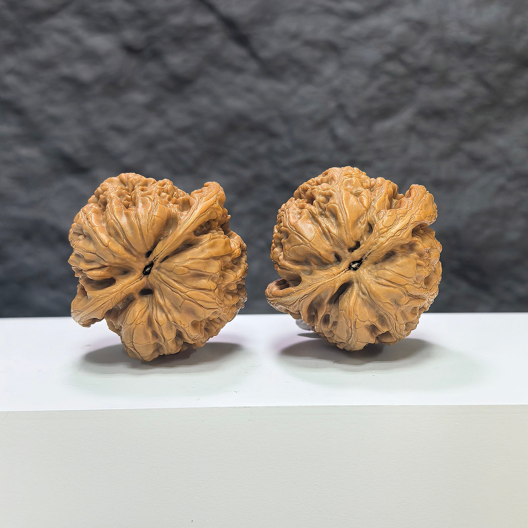 Pair of North China General Shoulder Wenwan Walnuts from Wenwan Art, 40mm size, showcasing detailed walnut carvings.