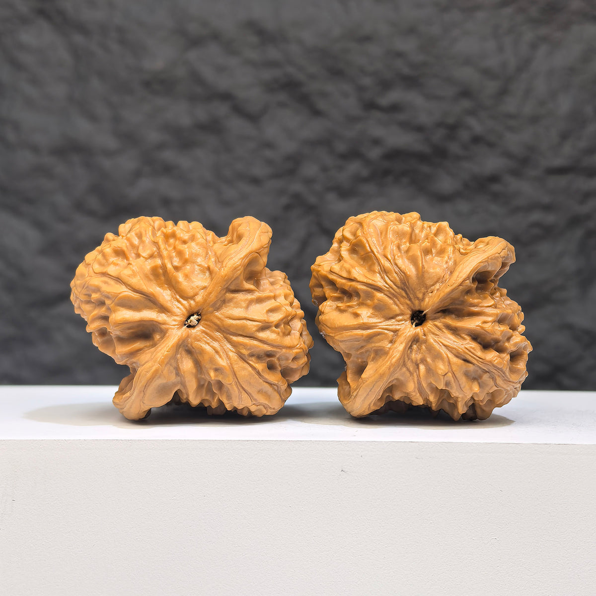 Wild Wolf Wenwan Walnut pair by Wenwan Art, authentic natural walnuts with 38mm x 40mm size, showcasing rich wood grain details.