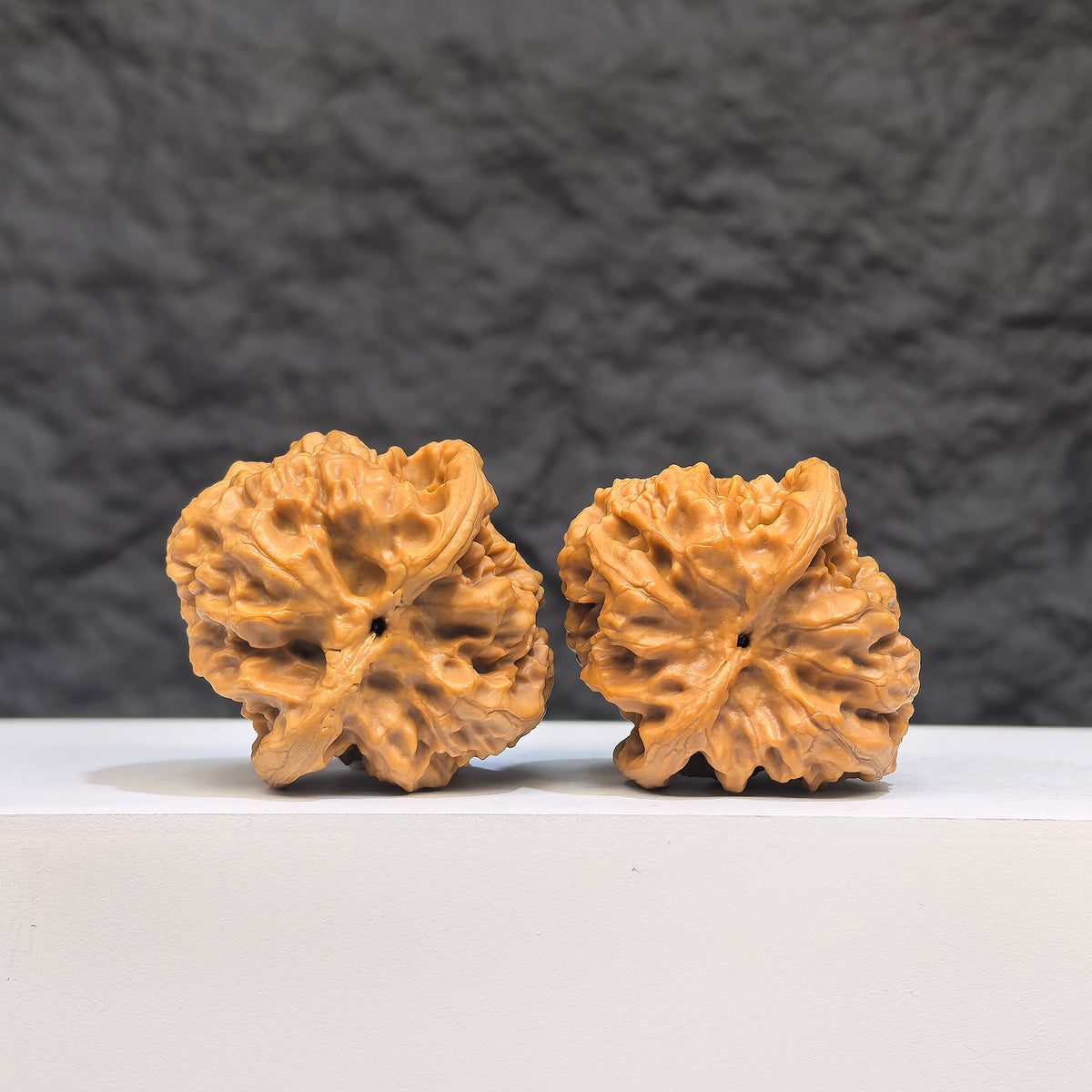 Authentic Wild Wenwan Walnut pair from Wenwan Art, featuring natural wood grain, 33mm x 36mm size, wild wolf design.