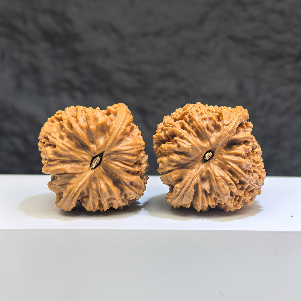 Pair of Nanjiangstone Wenwan walnuts from Wenwan Art, 40mm x 40mm, featuring natural stone textures and traditional craftsmanship.