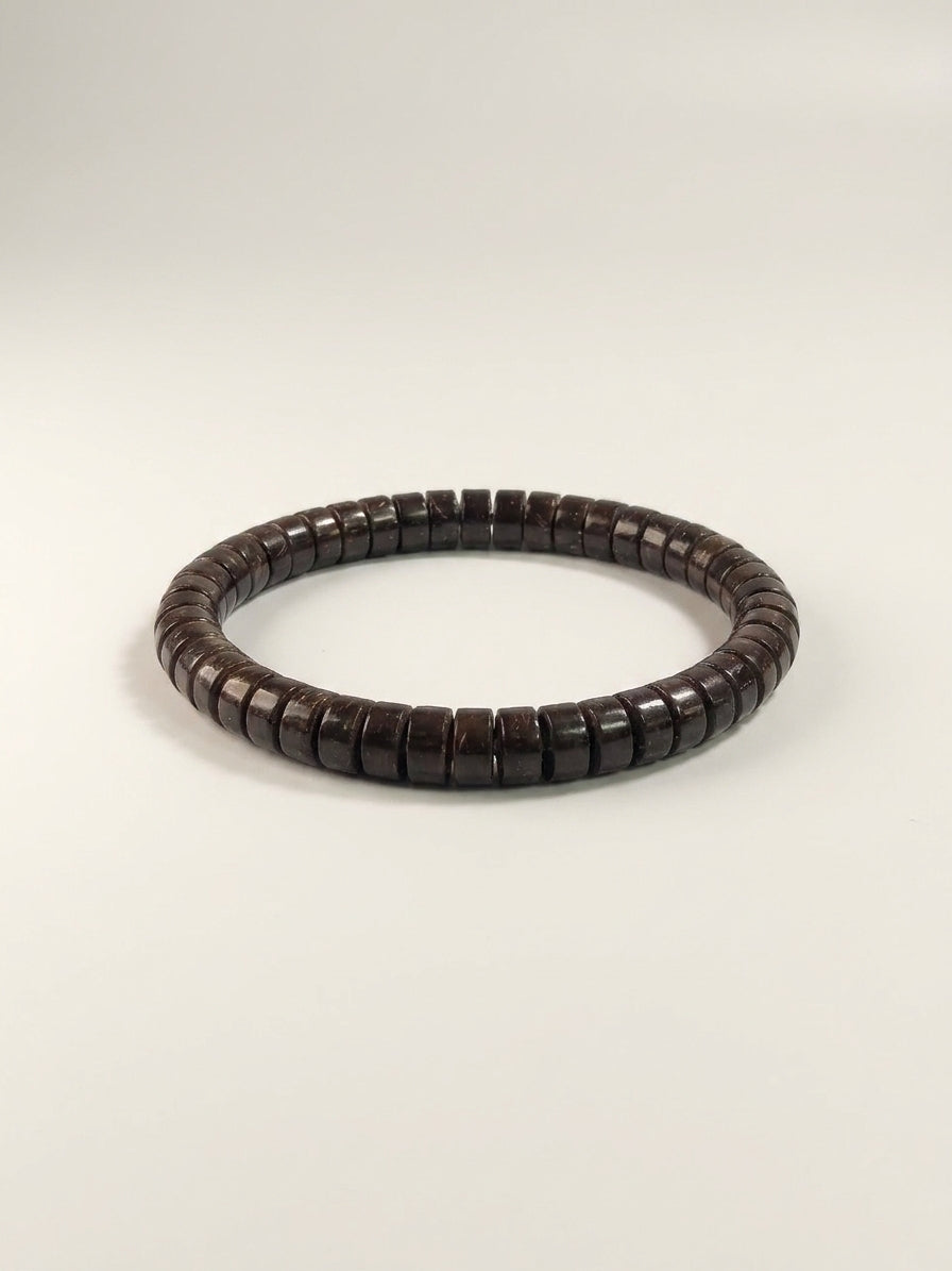 Natural coconut shell straight-cut tablet bracelet by ZenWenwan featuring 7mm beads on a flexible cord.