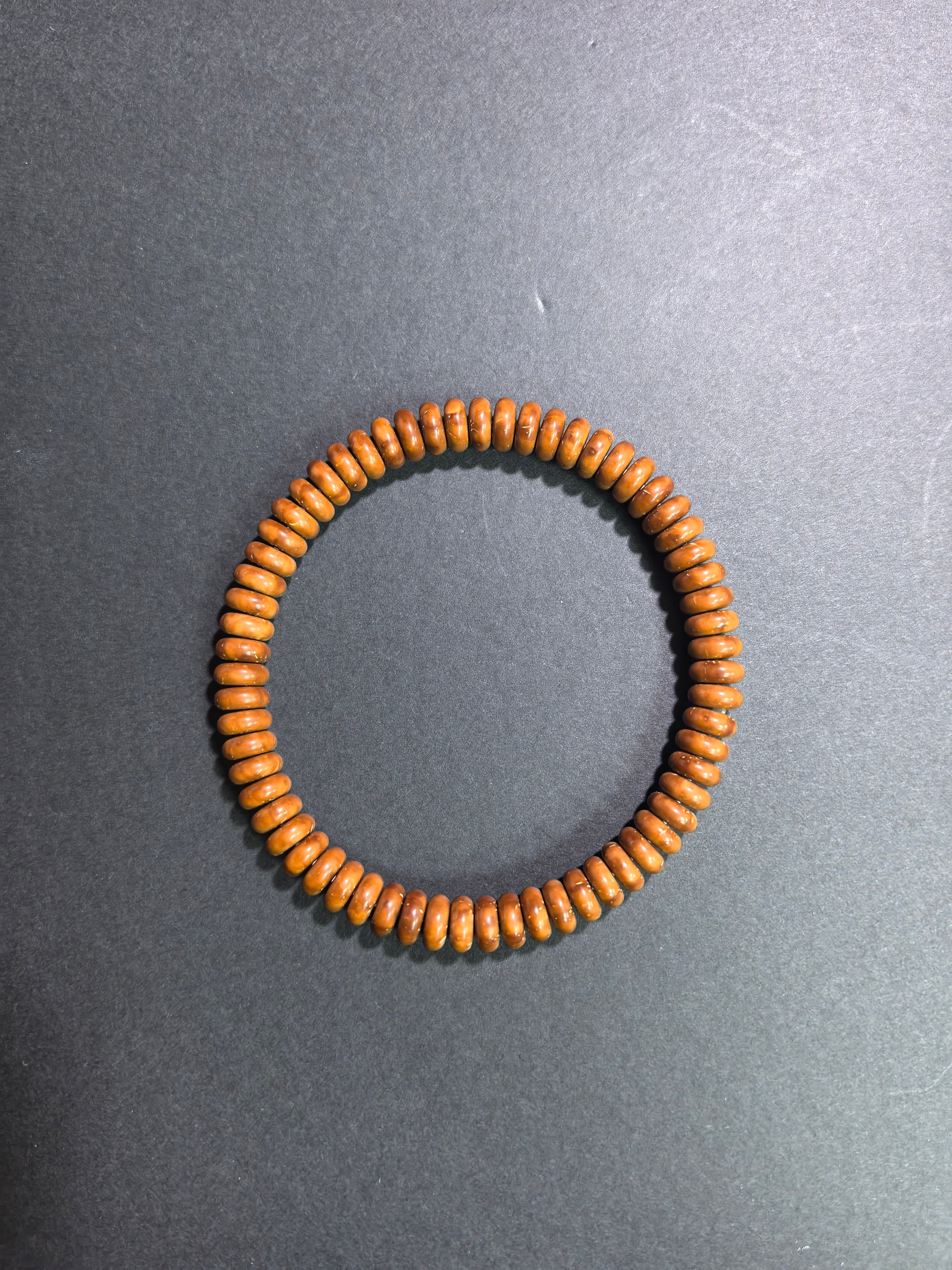 ZenWenwan Solid Fortune Seed (Zi Jin Shu) bracelet with 7.5mm beads, featuring traditional Chinese style and craftsmanship.