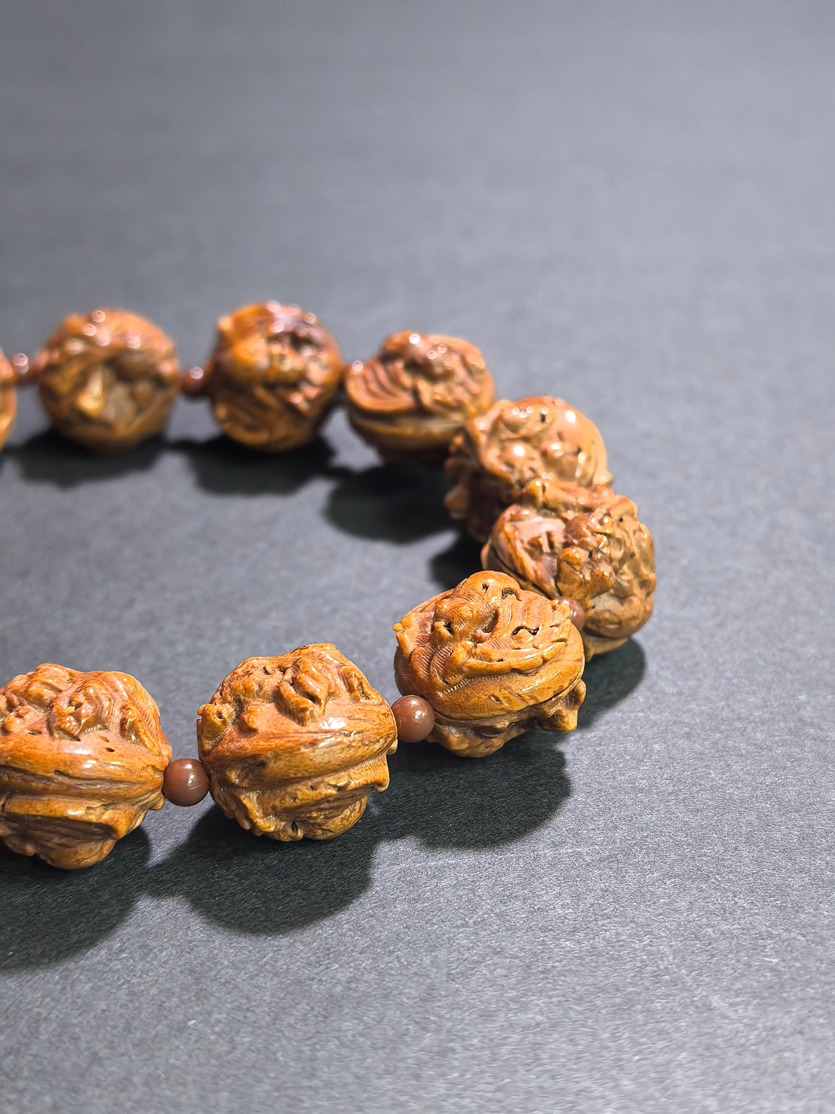 Hand-carved walnut bracelet featuring goldfish and bat motifs, 16mm size, from ZenWenwan, symbolizing abundance and blessings.