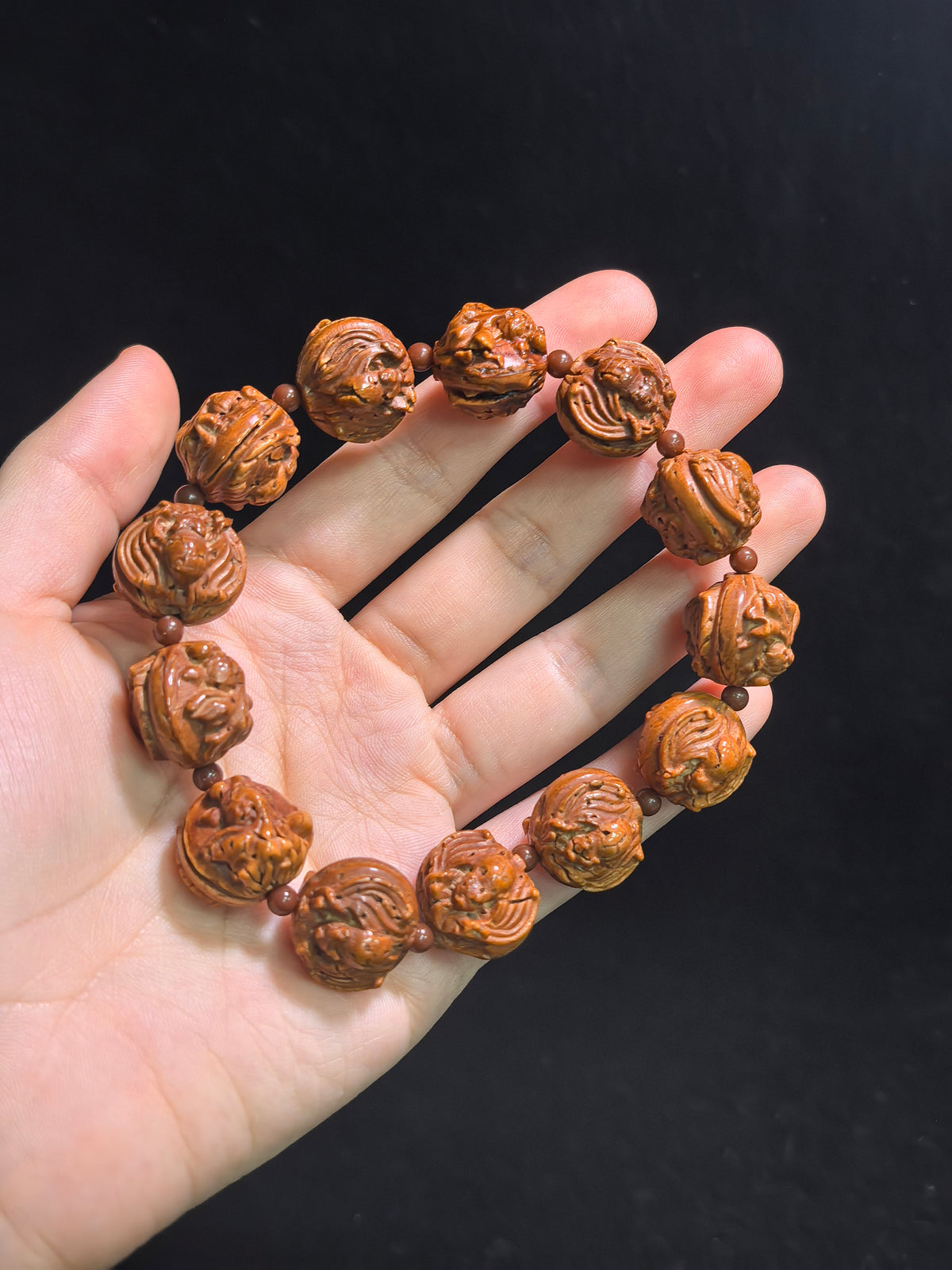 Hand-carved walnut bracelet featuring goldfish and bat motifs, 16mm beads, by ZenWenwan, symbolizing abundance and blessings.
