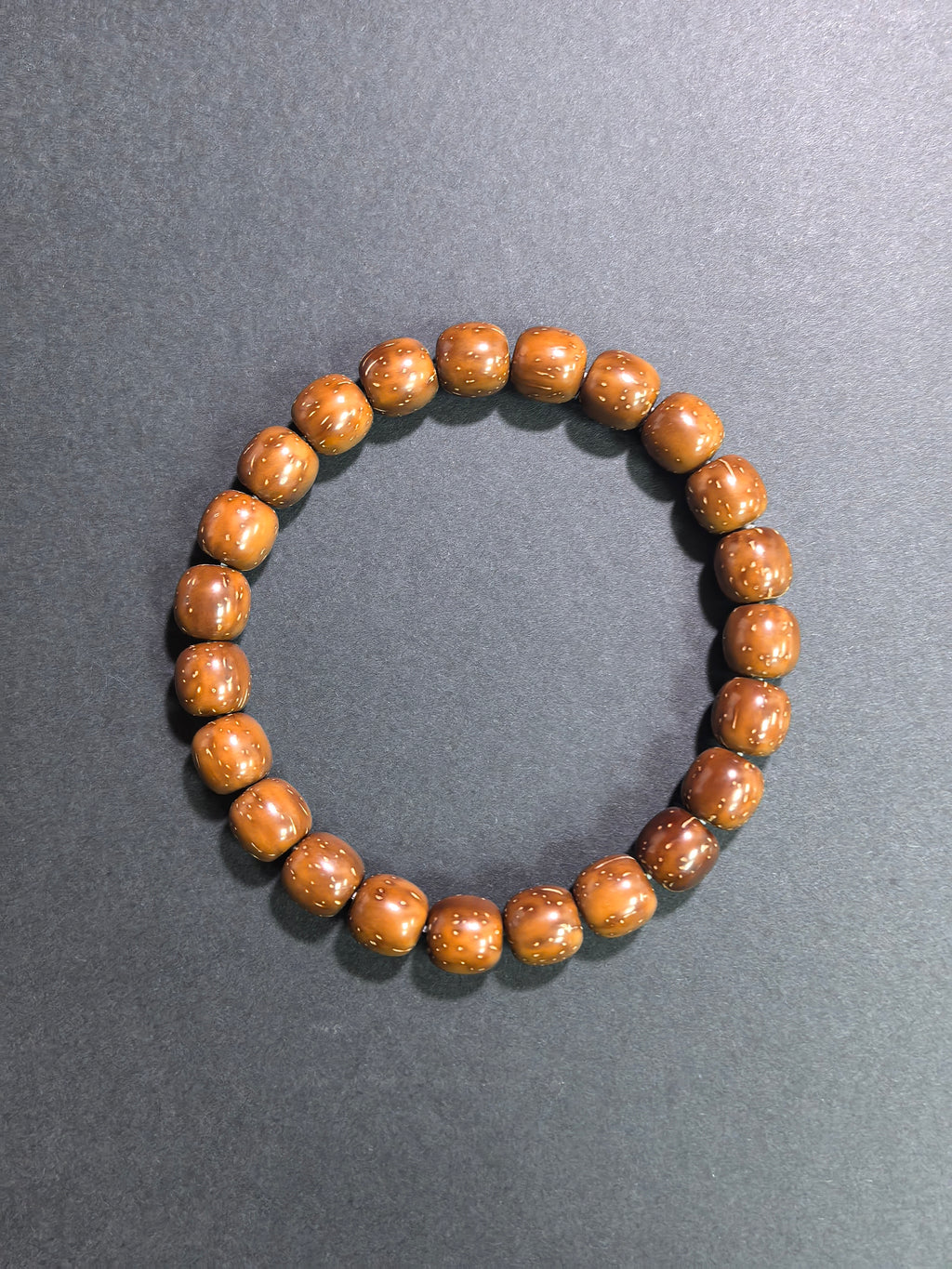 ZenWenwan Natural Fortune Seed (Zi Jin Shu) classic 9mm barrel bracelet with smooth, polished seed beads for elegant style.