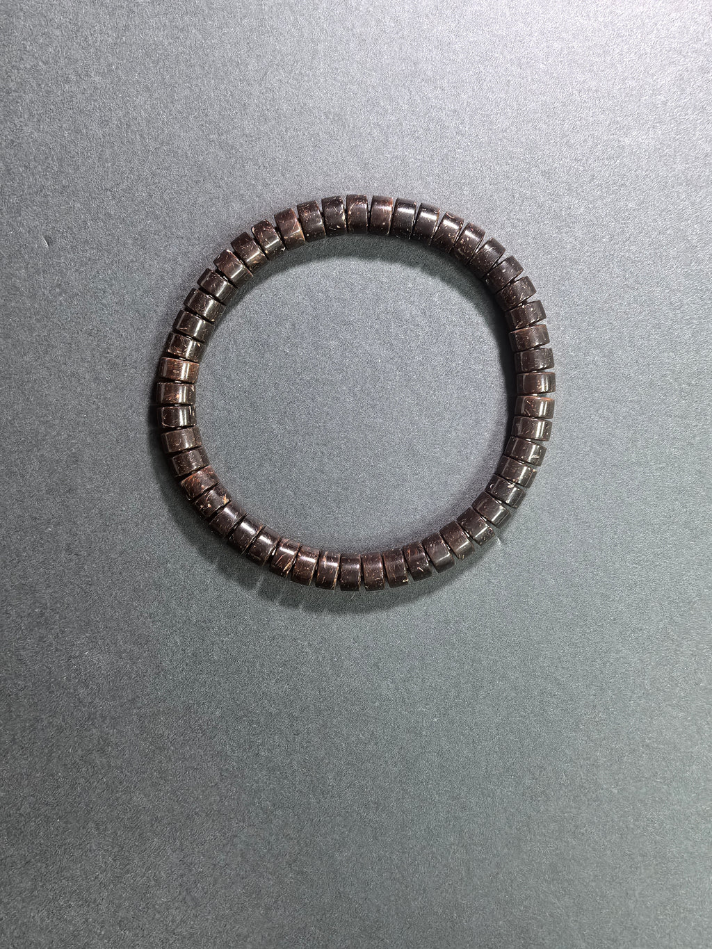 Natural coconut shell straight-cut tablet bracelet by ZenWenwan, 7mm diameter, featuring earthy coconut shell beads on a stylish bracelet.