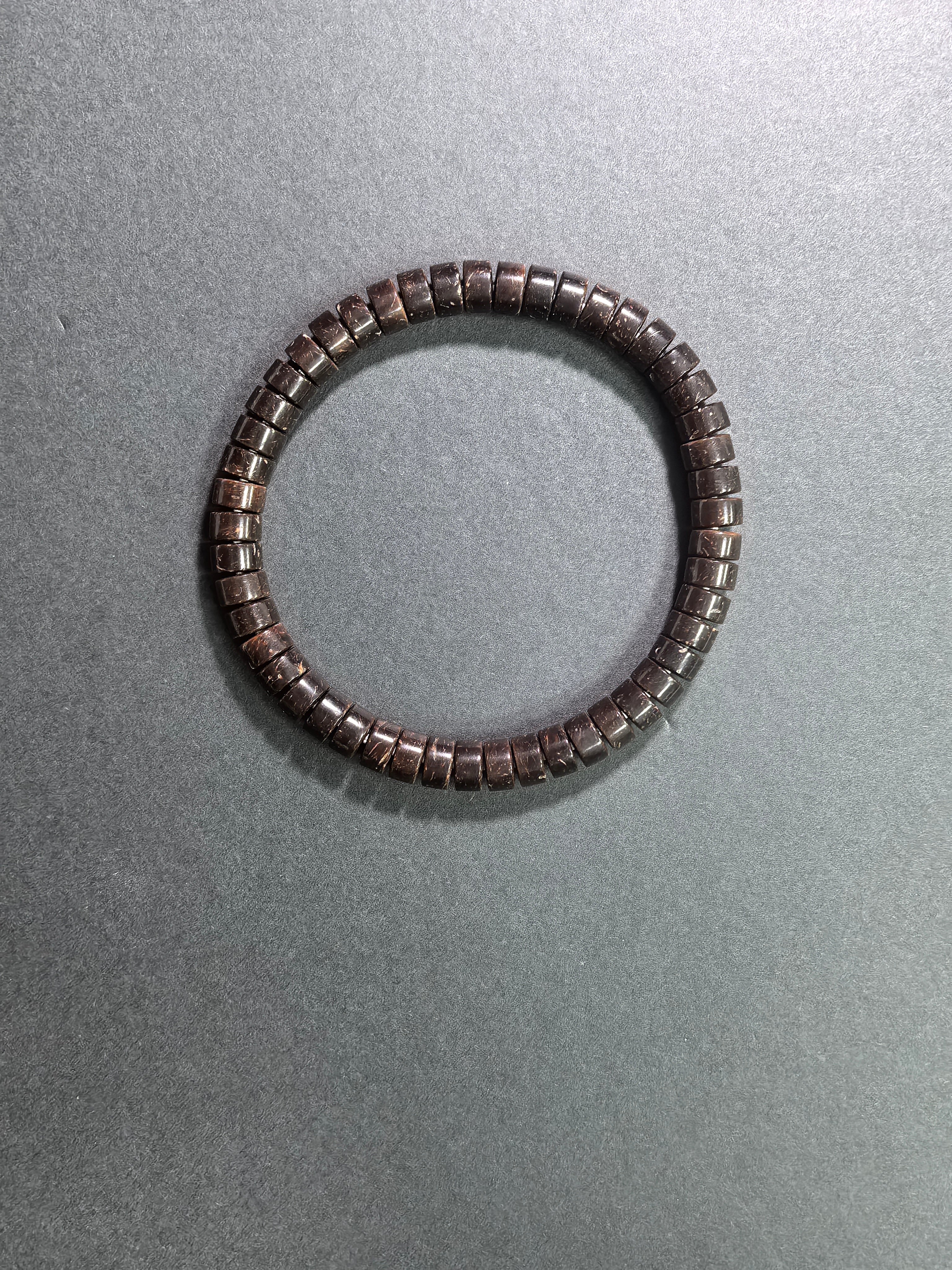 Natural coconut shell straight-cut tablet bracelet by ZenWenwan, 7mm diameter, featuring earthy coconut shell beads on a stylish bracelet.