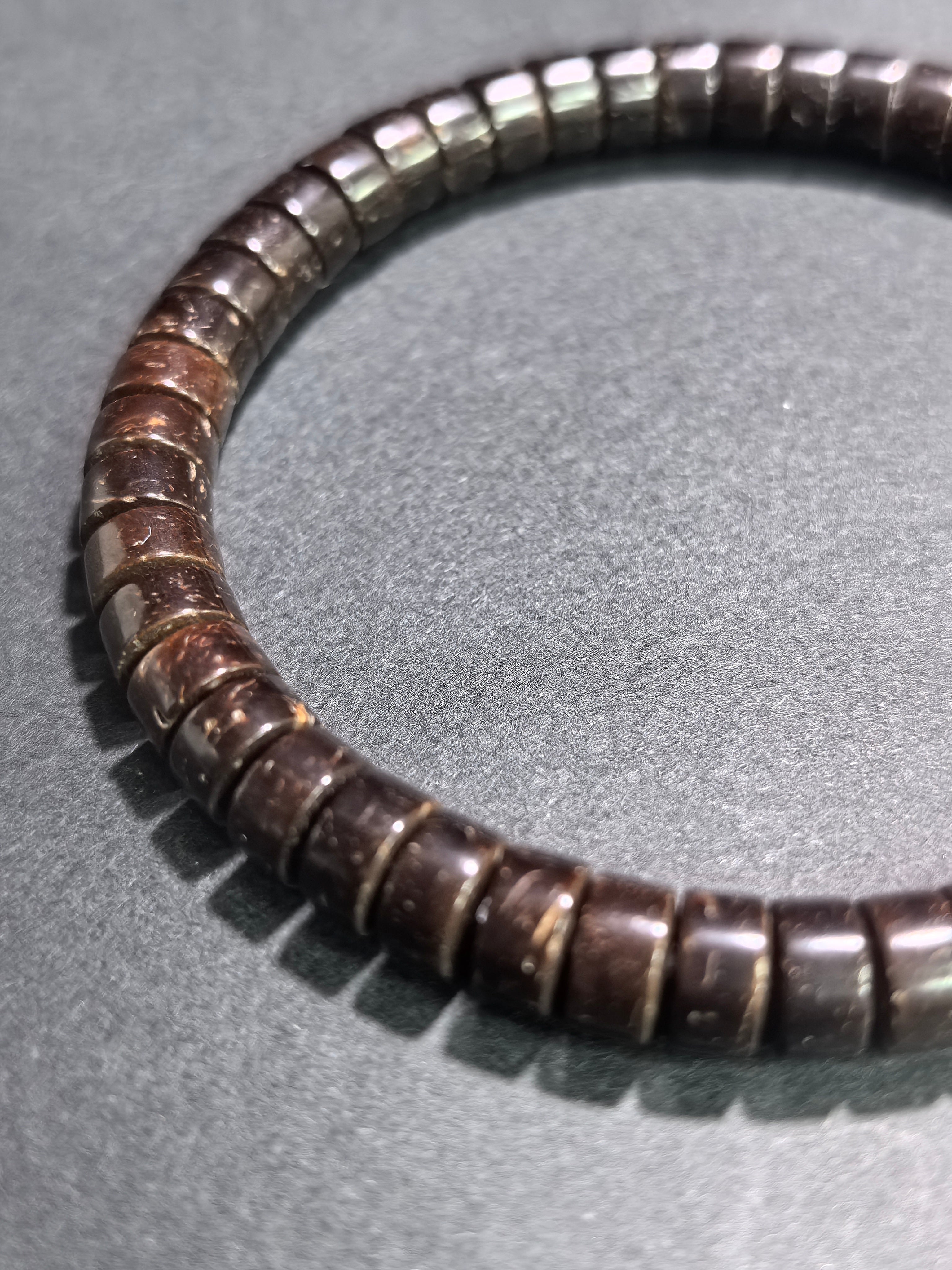 Natural coconut shell straight-cut tablet bracelet by ZenWenwan, 7mm beads, stylish and eco-friendly jewelry accessory.